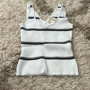 Tank top it’s an xs but super stretchy